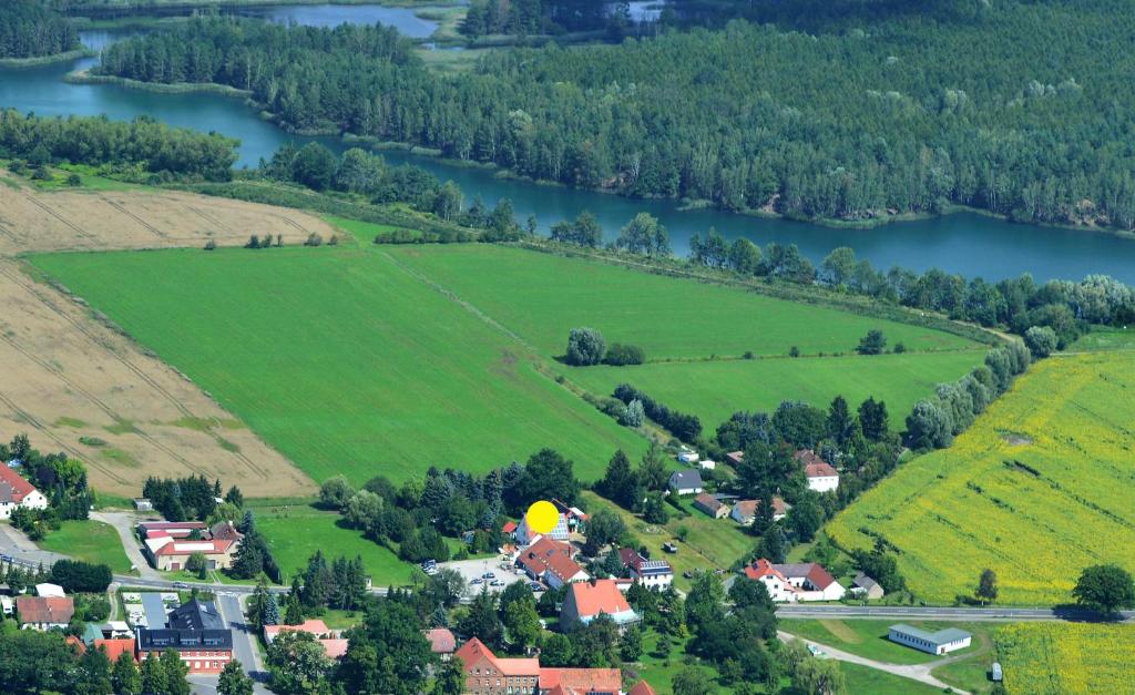 an aerial view of a small village with a river at Pension Marina in Lauta Dorf