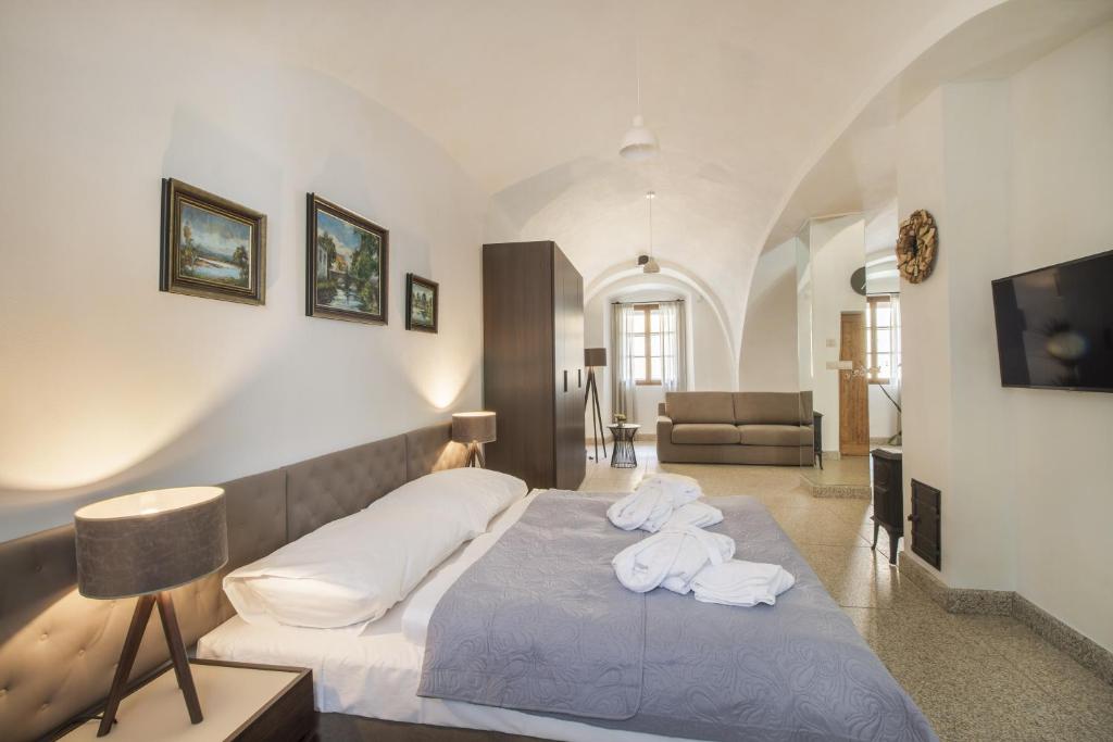 Ένα ή περισσότερα κρεβάτια σε δωμάτιο στο Apartmány Šupina