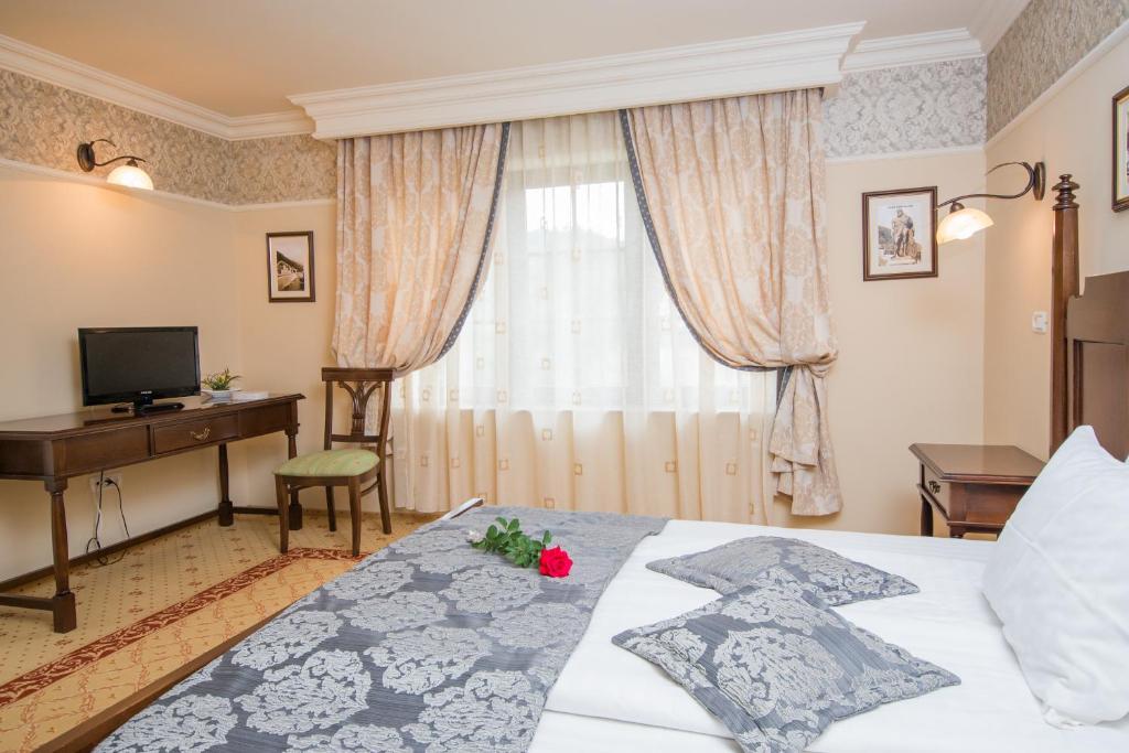 Postel nebo postele na pokoji v ubytování Pension Noblesse