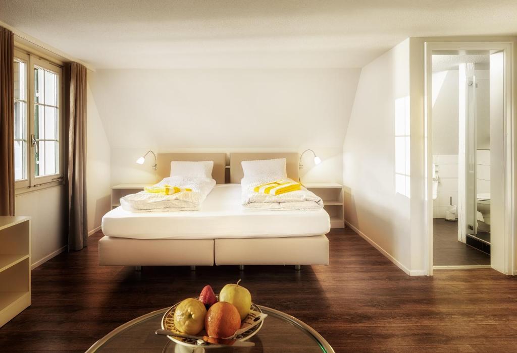 Postel nebo postele na pokoji v ubytování Seehotel Baumgarten