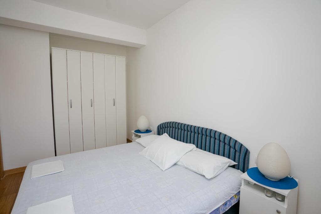 Postel nebo postele na pokoji v ubytování Apartment with sea view