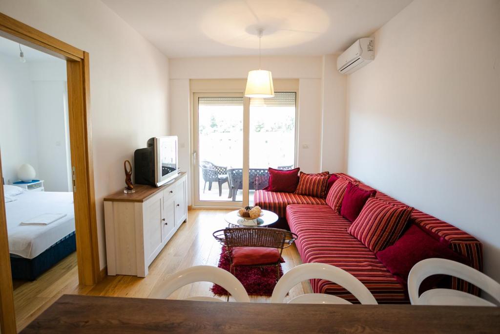 TV a/nebo společenská místnost v ubytování Apartment with sea view