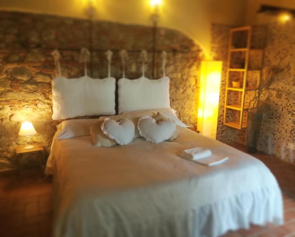 Giường trong phòng chung tại Podere Borgaruccio