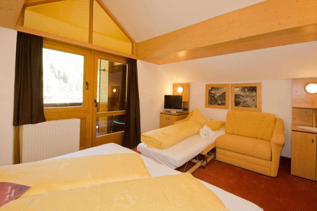 Postel nebo postele na pokoji v ubytování Hotel Garni Hainbacherhof