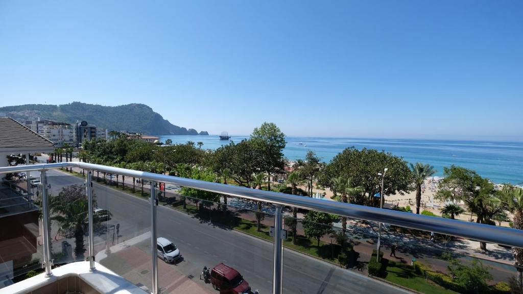 a view of the ocean from a balcony at Cleopatra Golden Beach Hotel in Alanya
