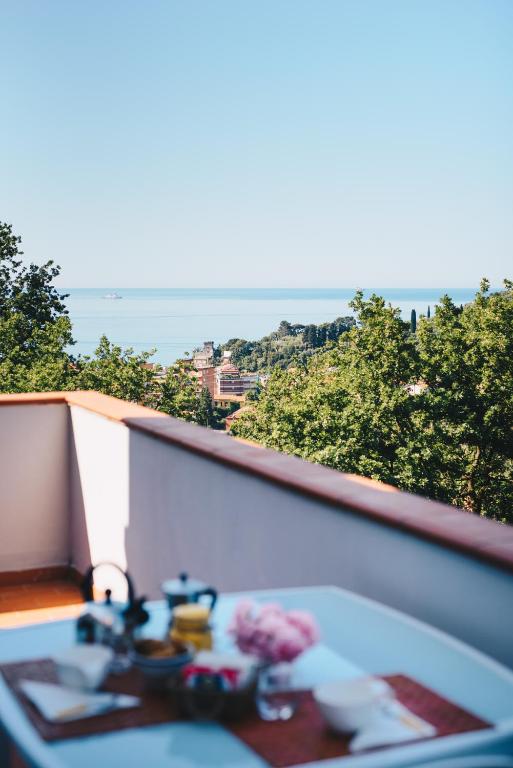 a bathroom sink with a view of the ocean at La Torretta in Lerici