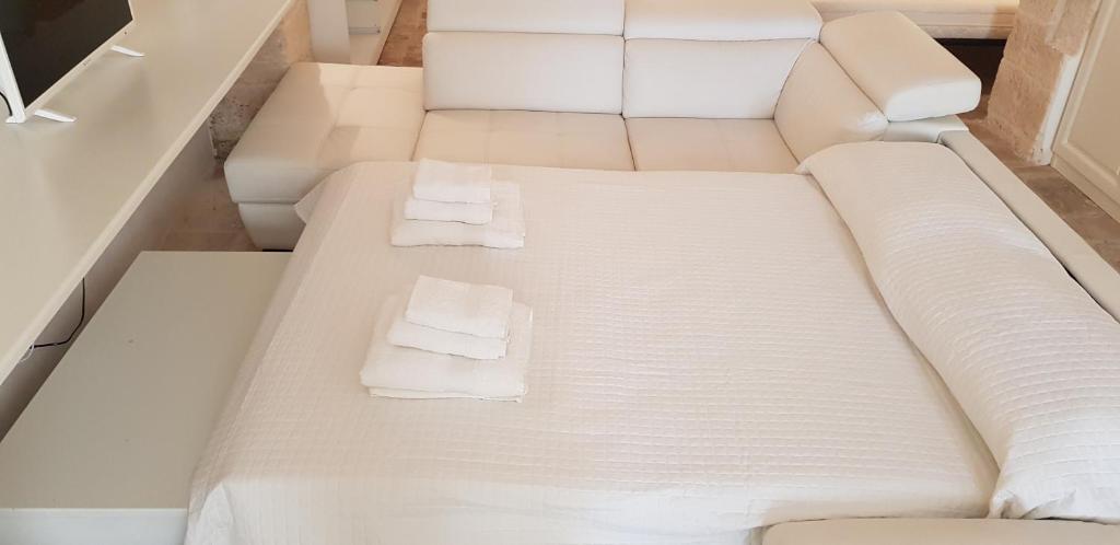 Postel nebo postele na pokoji v ubytování La casa di Sara