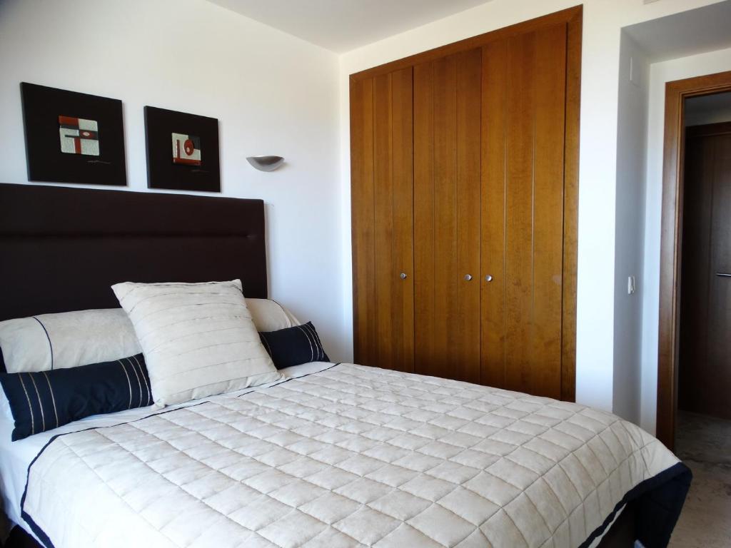 Posteľ alebo postele v izbe v ubytovaní Apartamento Eleonor, La Entrada, Punta Prima, Torrevieja