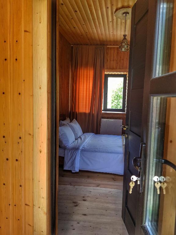 Postel nebo postele na pokoji v ubytování Bana