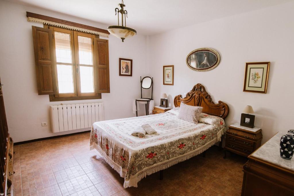 Łóżko lub łóżka w pokoju w obiekcie Cortijo Rural Majolero