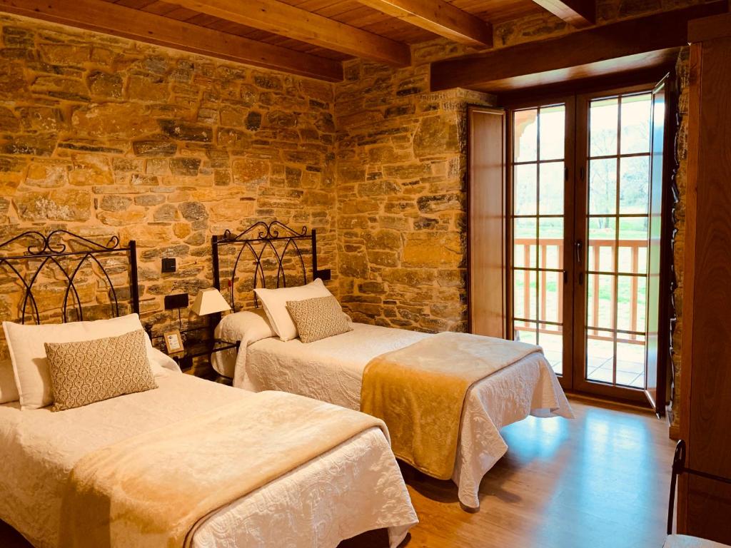 Lova arba lovos apgyvendinimo įstaigoje Casa Lixa Hotel Rural Albergue
