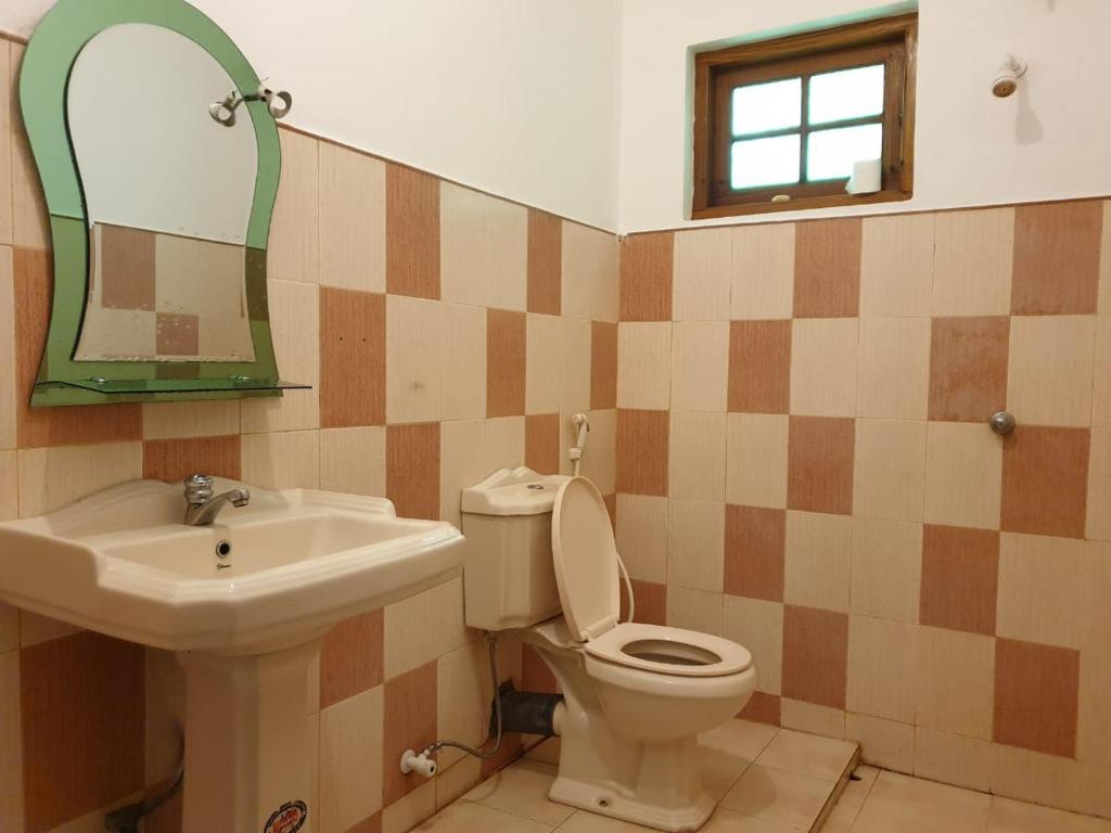 Koupelna v ubytování Rupa's Hotel