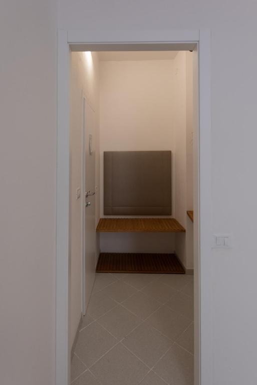 Televízia a/alebo spoločenská miestnosť v ubytovaní L'EMPORIO ROOMS