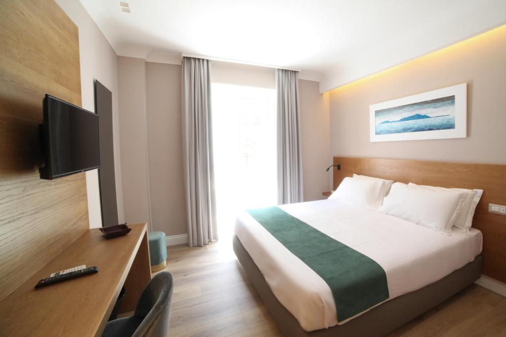 Telewizja i/lub zestaw kina domowego w obiekcie Toledo Relais Exclusive Rooms - By Pera Rooms Collection