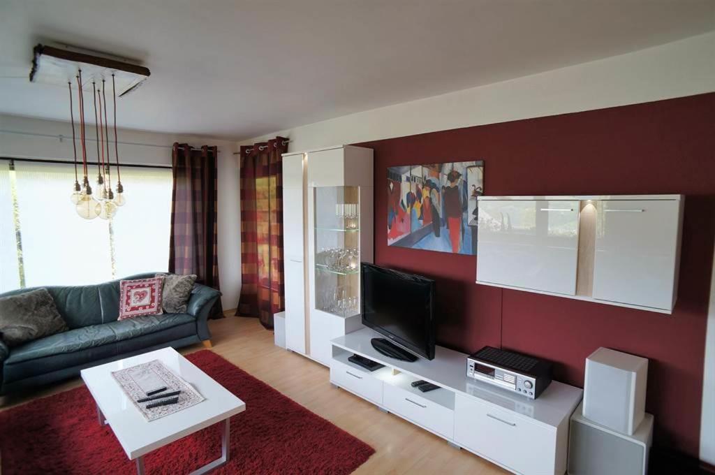 Televízia a/alebo spoločenská miestnosť v ubytovaní Ferienhaus Klaas
