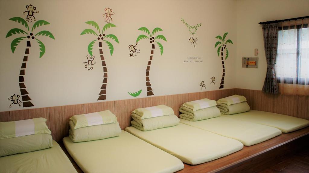 Katil atau katil-katil dalam bilik di Recreation Garden B&B