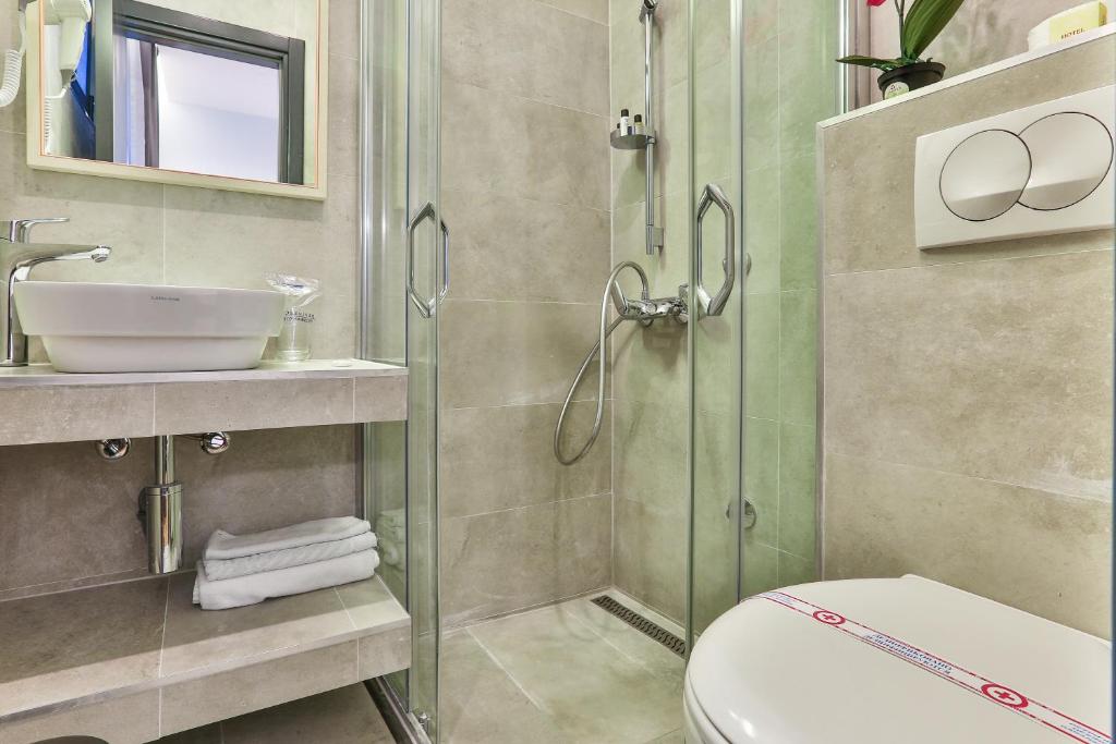 Koupelna v ubytování Hotel M
