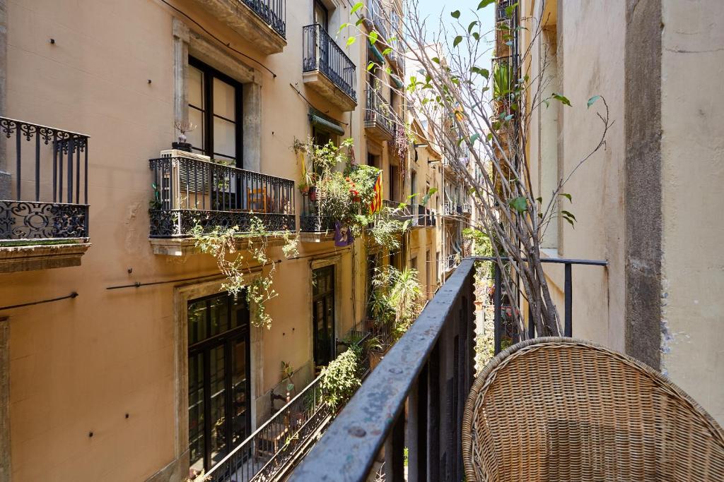 a balcony in front of a building with balconies at Casa Cosi - Gotico in Barcelona