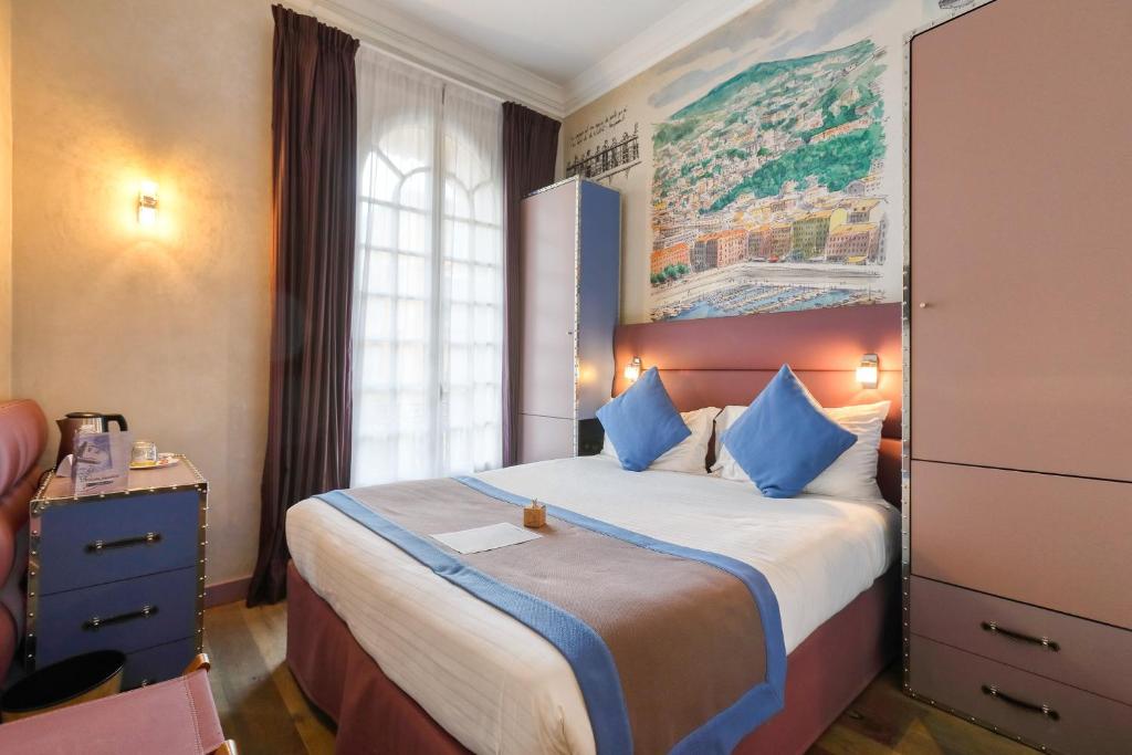 Postel nebo postele na pokoji v ubytování Nice Excelsior Centre ville by HappyCulture