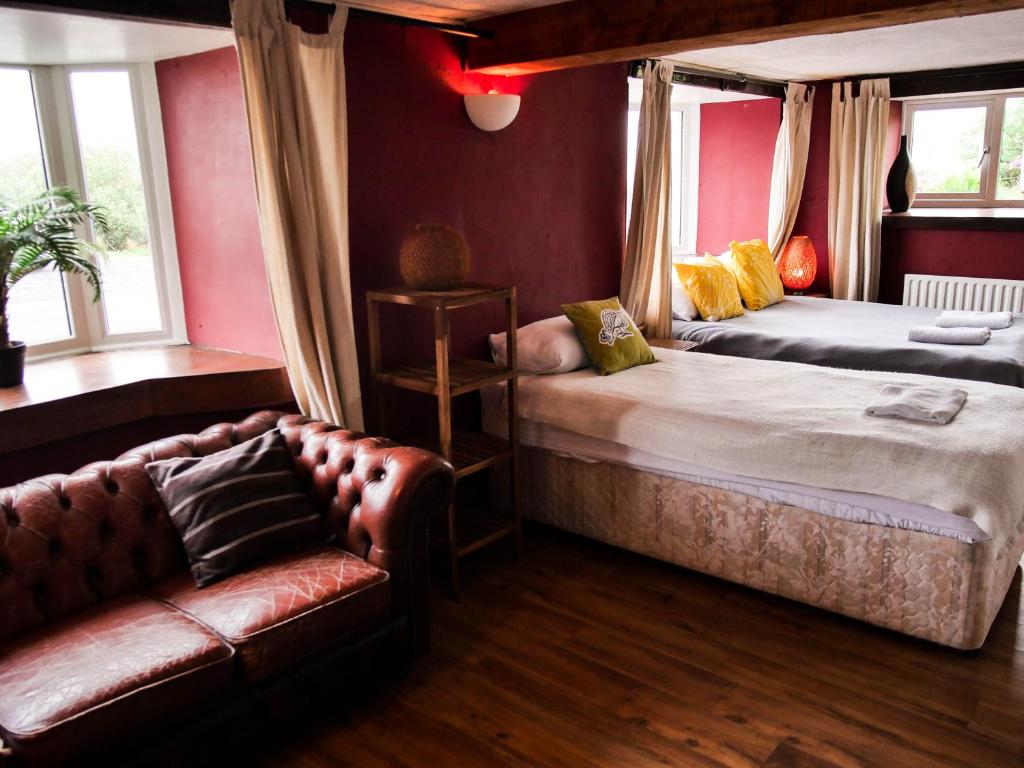 Voodi või voodid majutusasutuse Pure Magic Lodge toas