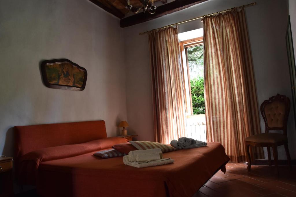 Postel nebo postele na pokoji v ubytování Borgo Vecchio