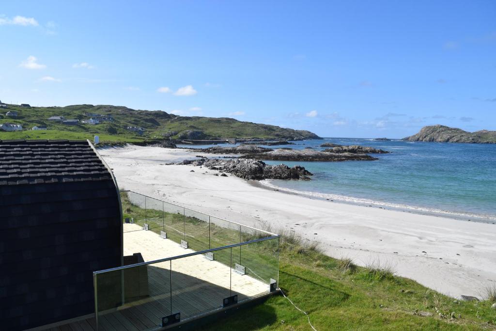 a view of the beach from a house at The Beach Bothies in Valtos
