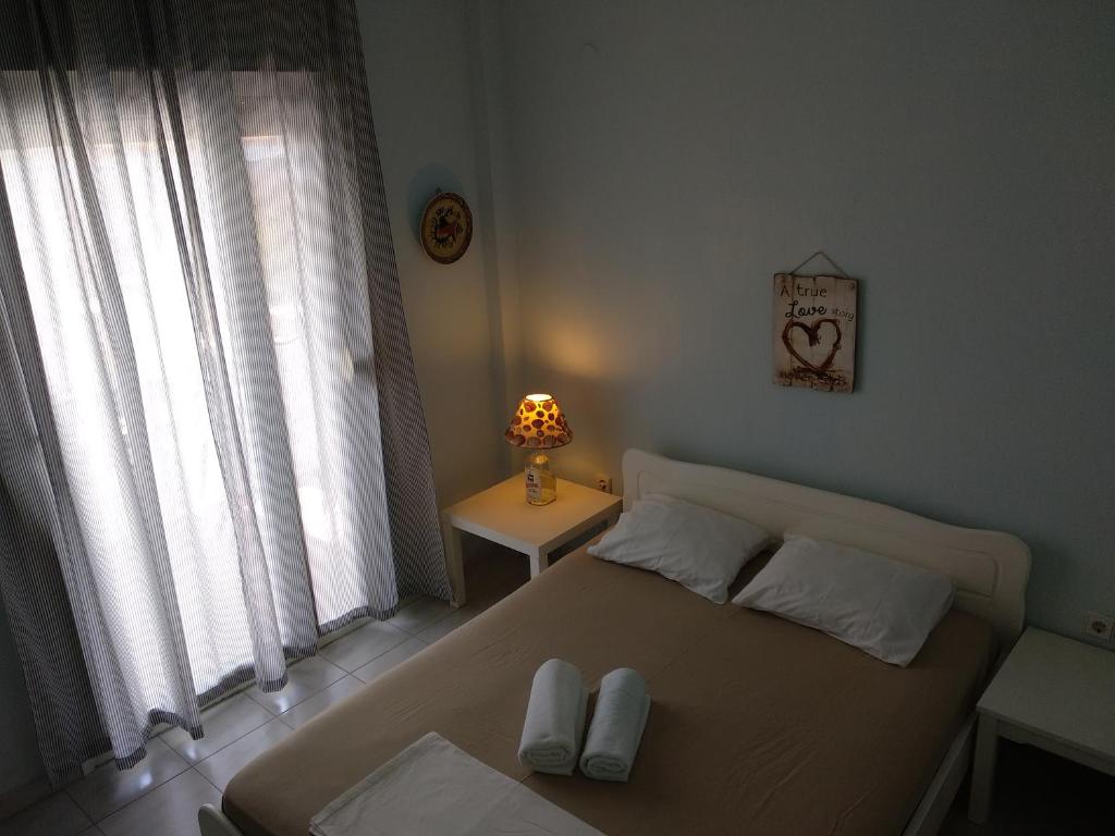 Postel nebo postele na pokoji v ubytování siviri pliades!