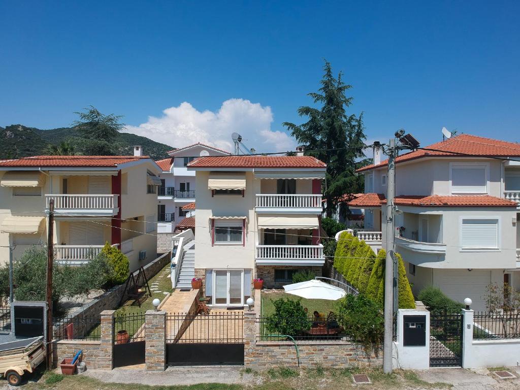 a row of houses in a residential neighbourhood at Starfish Villa in Iraklitsa