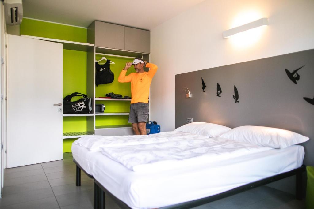 Postel nebo postele na pokoji v ubytování Residence Centro Vela