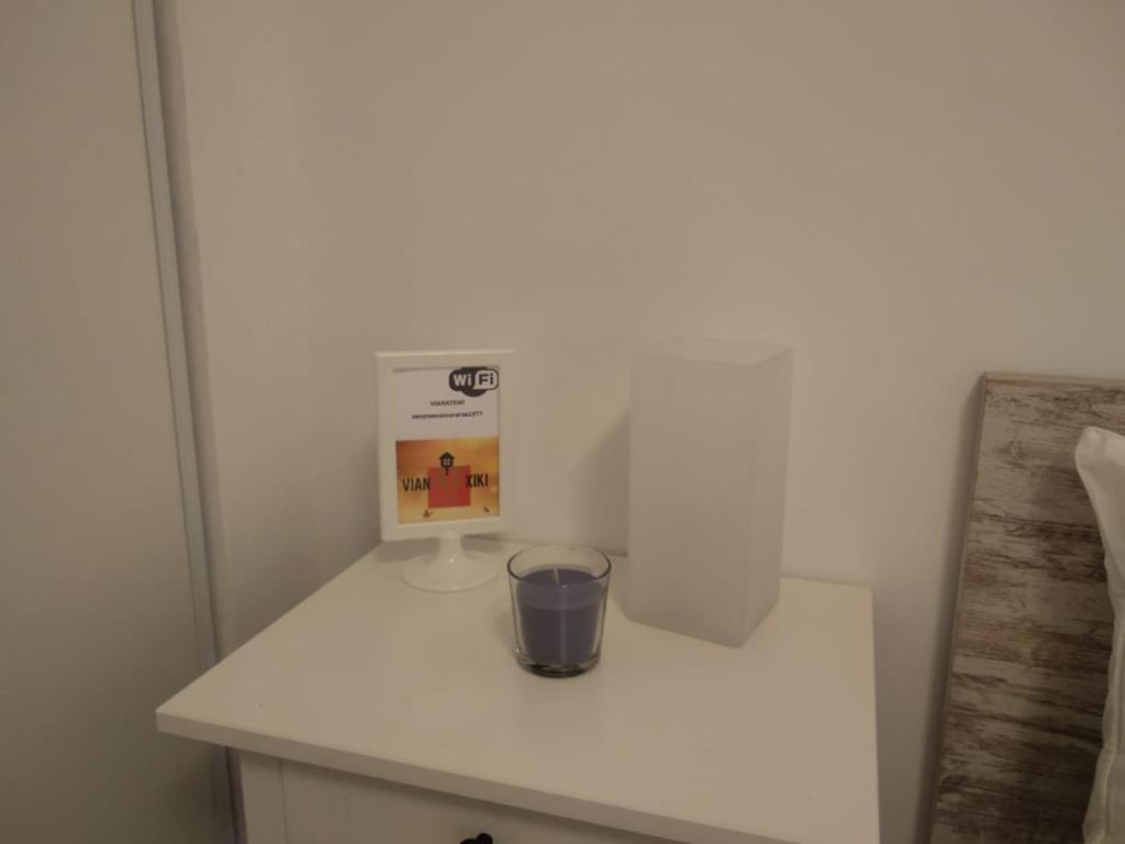 a white counter with a cup on top of it at Vianatxiki in Viana