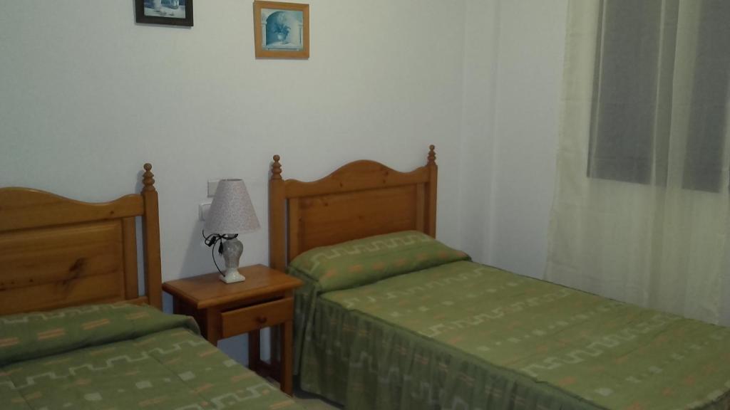 Posteľ alebo postele v izbe v ubytovaní Apartamento 3 Hab. en el Parador