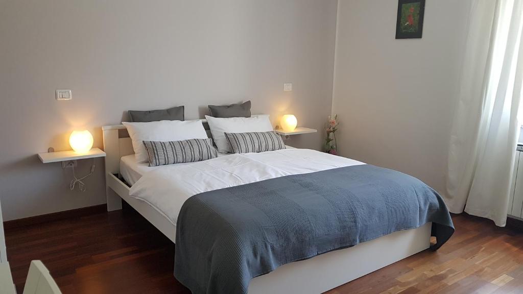 Postel nebo postele na pokoji v ubytování Guesthouse Pri Mihelovih