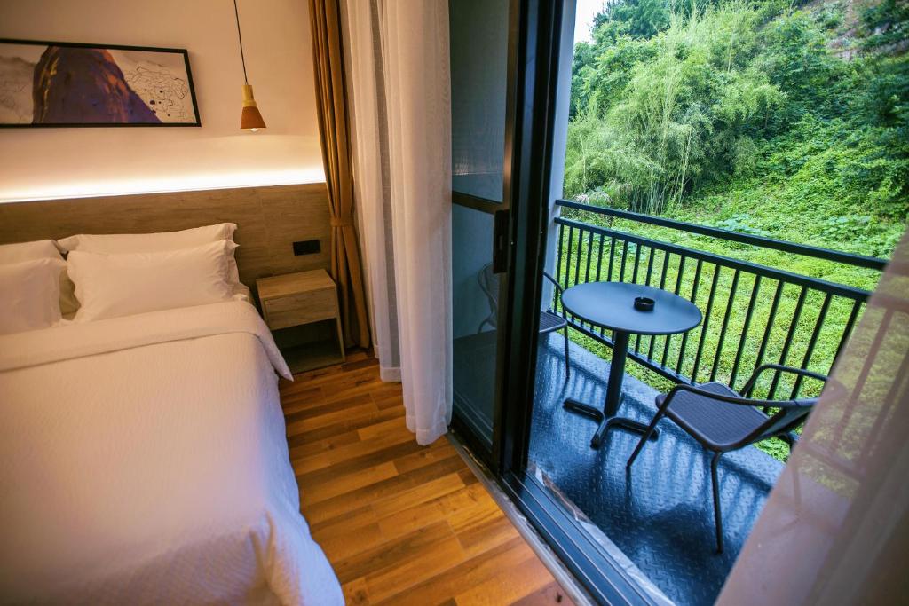 Balkón nebo terasa v ubytování National Forest Park(Yangjiajie ) MINI Inn