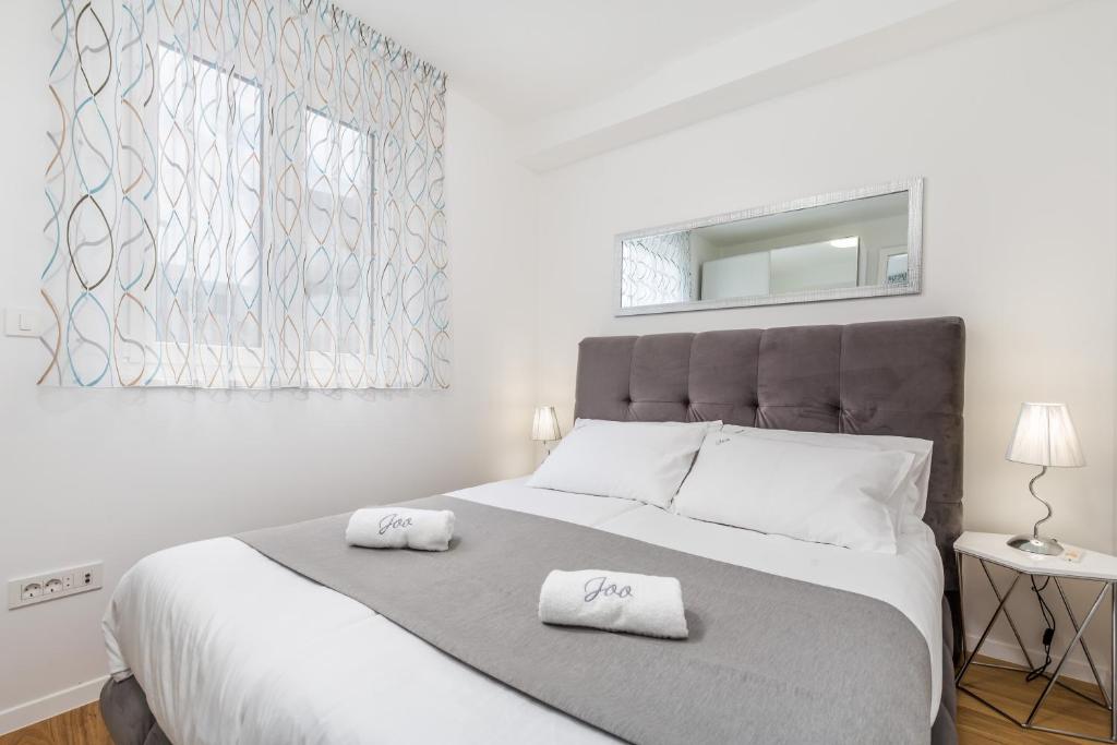Posteľ alebo postele v izbe v ubytovaní Luxury Apartment Joo & Joo