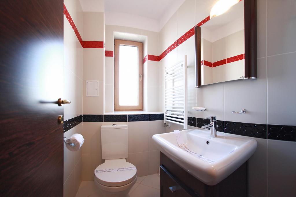 Koupelna v ubytování Monte Carlo Palace Suites