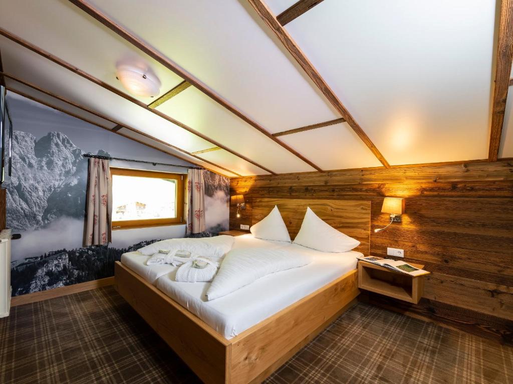 Postel nebo postele na pokoji v ubytování Hotel Kitzspitz