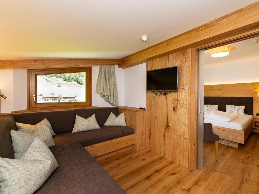 Postel nebo postele na pokoji v ubytování Hotel Kitzspitz