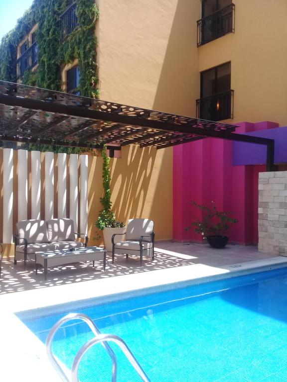 Bazén v ubytování Hotel Plaza Colonial nebo v jeho okolí