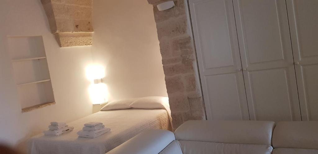 Postel nebo postele na pokoji v ubytování La casa di Sara