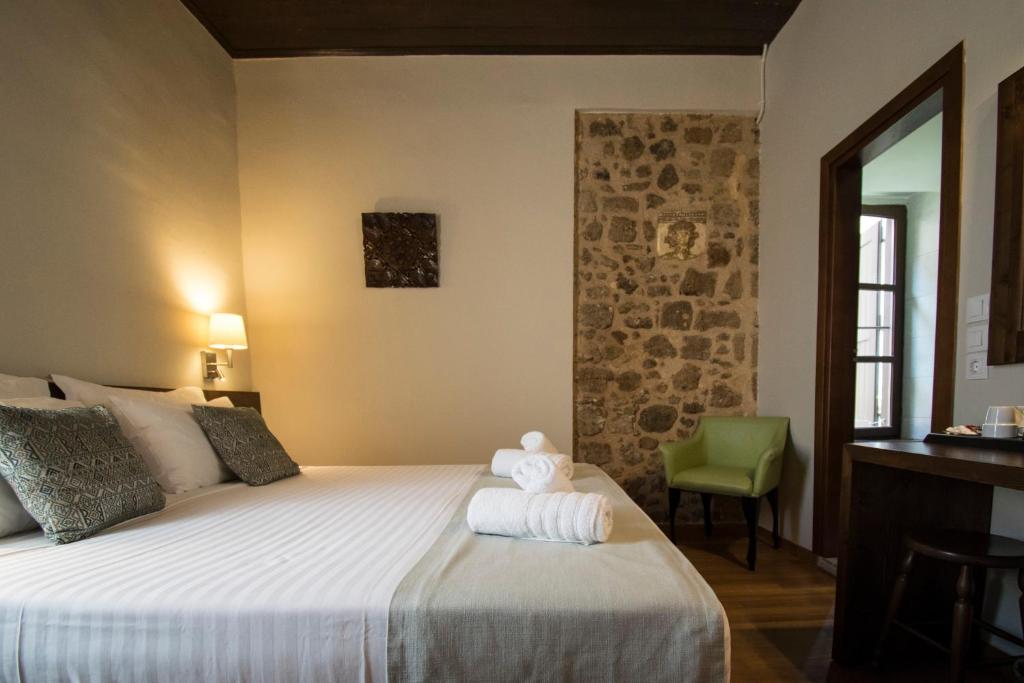 Postel nebo postele na pokoji v ubytování D'Argento Boutique Rooms