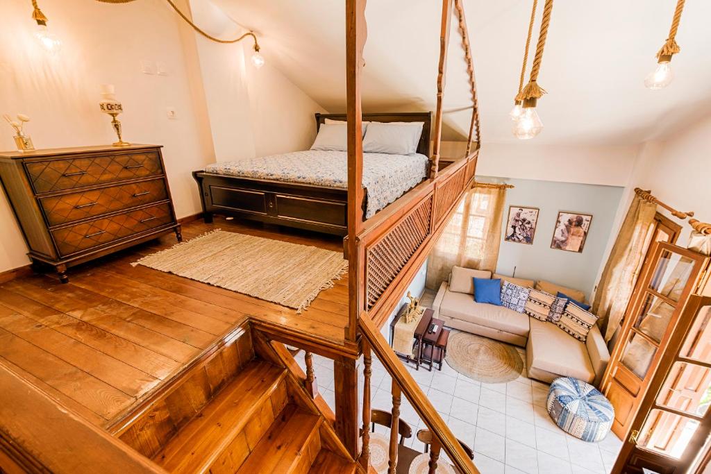 an overhead view of a bedroom with a bunk bed at The Old Symi in Symi