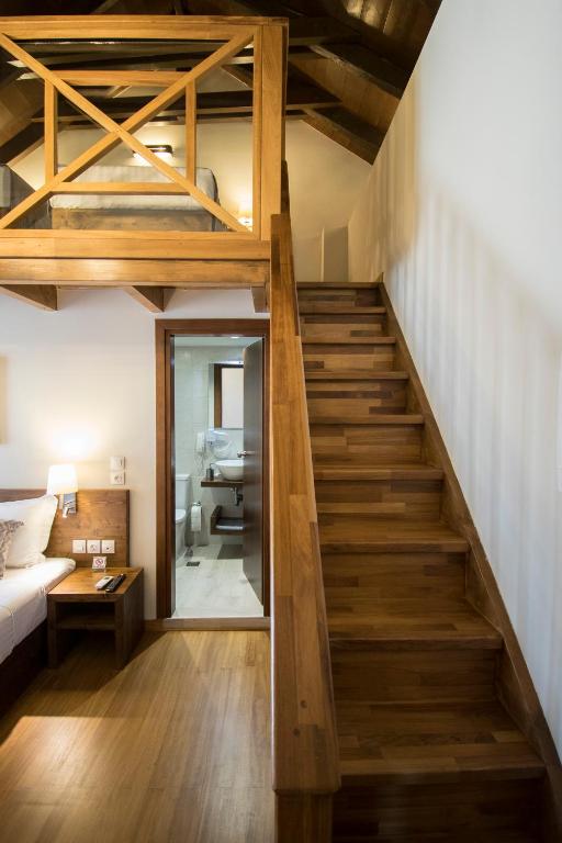 Postel nebo postele na pokoji v ubytování D'Argento Boutique Rooms
