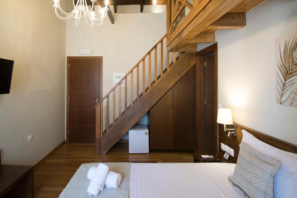 Postel nebo postele na pokoji v ubytování D'Argento Boutique Rooms