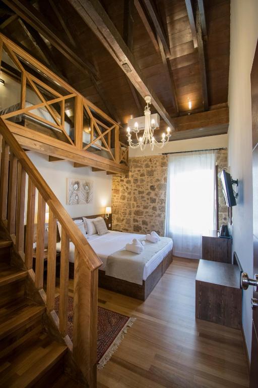 Postel nebo postele na pokoji v ubytování D'Argento Boutique Rooms