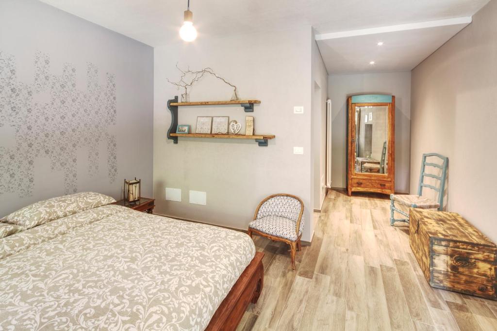 Posteľ alebo postele v izbe v ubytovaní Happy hill - appartamento Bambù- natura e relax