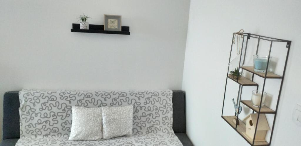 Postel nebo postele na pokoji v ubytování Jovich Apartments 3