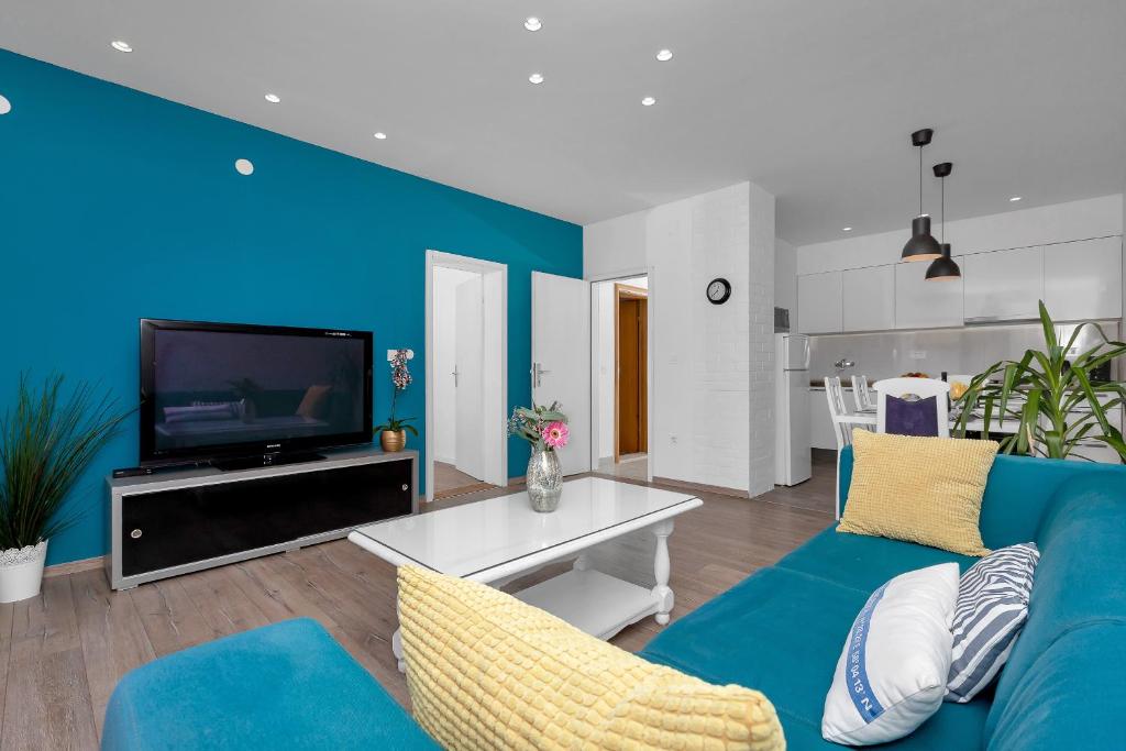 TV a/nebo společenská místnost v ubytování Blue Dream Apartment