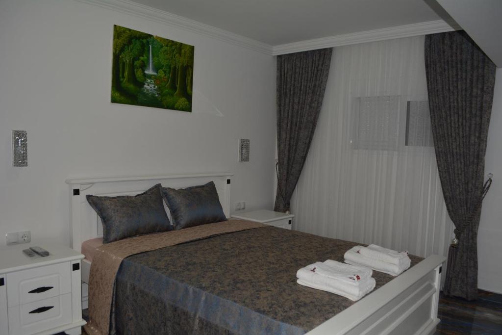 Posteľ alebo postele v izbe v ubytovaní VILLA IRAKLITSA SEA VIEW