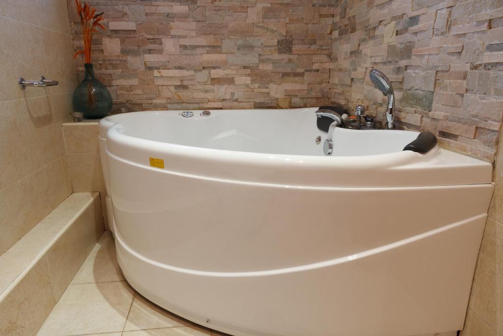 El Molí de Pontons Hotel Rural - Jacuzzi privado en la habitación en Pontons