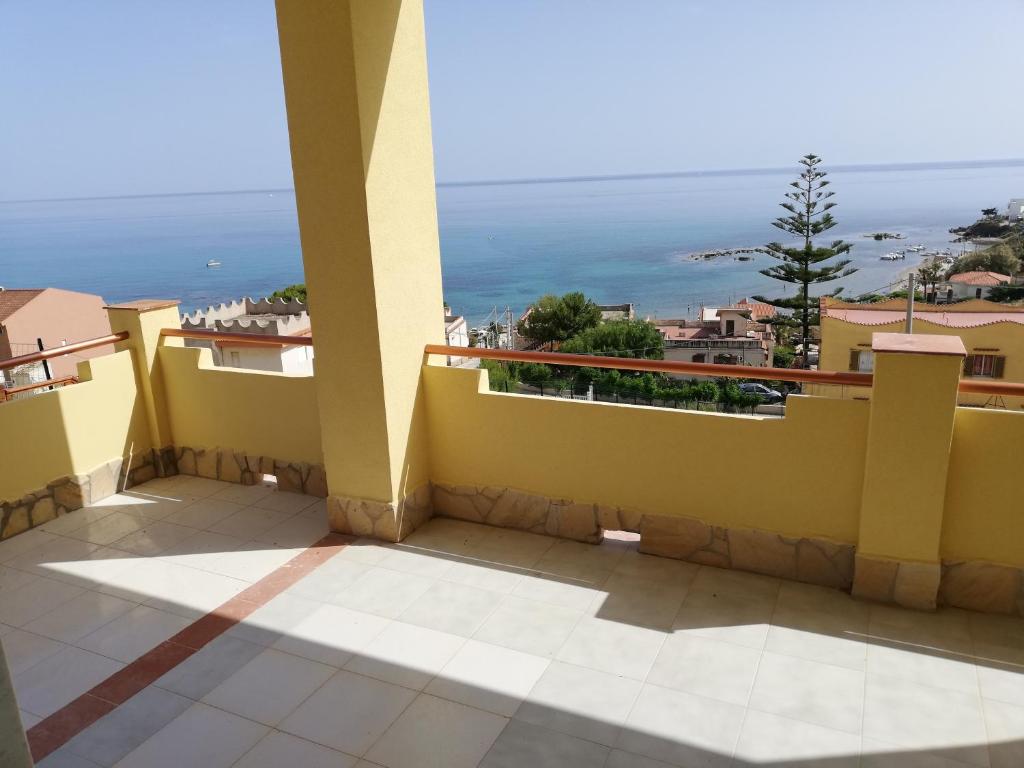 a balcony with a view of the ocean at Villa Fiorella in Sciacca